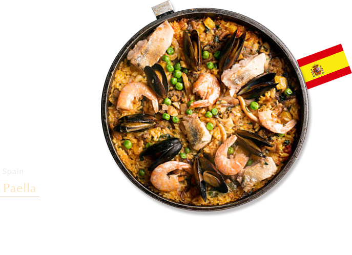 Spain: Paella Paella is made by adding rice and water to fried vegetables and seafood, then simmering the mixture with salt and saffron before finishing it in an oven. This dish uses short-grained rice.